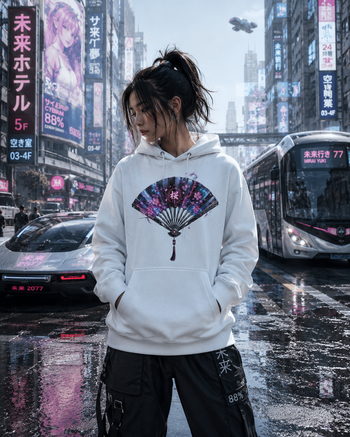 A woman stands on a wet city street wearing a white pullover hoodie with a large printed folding fan graphic on the front. The scene has neon signs, cars, and a train in the background, creating a cyberpunk urban environment.