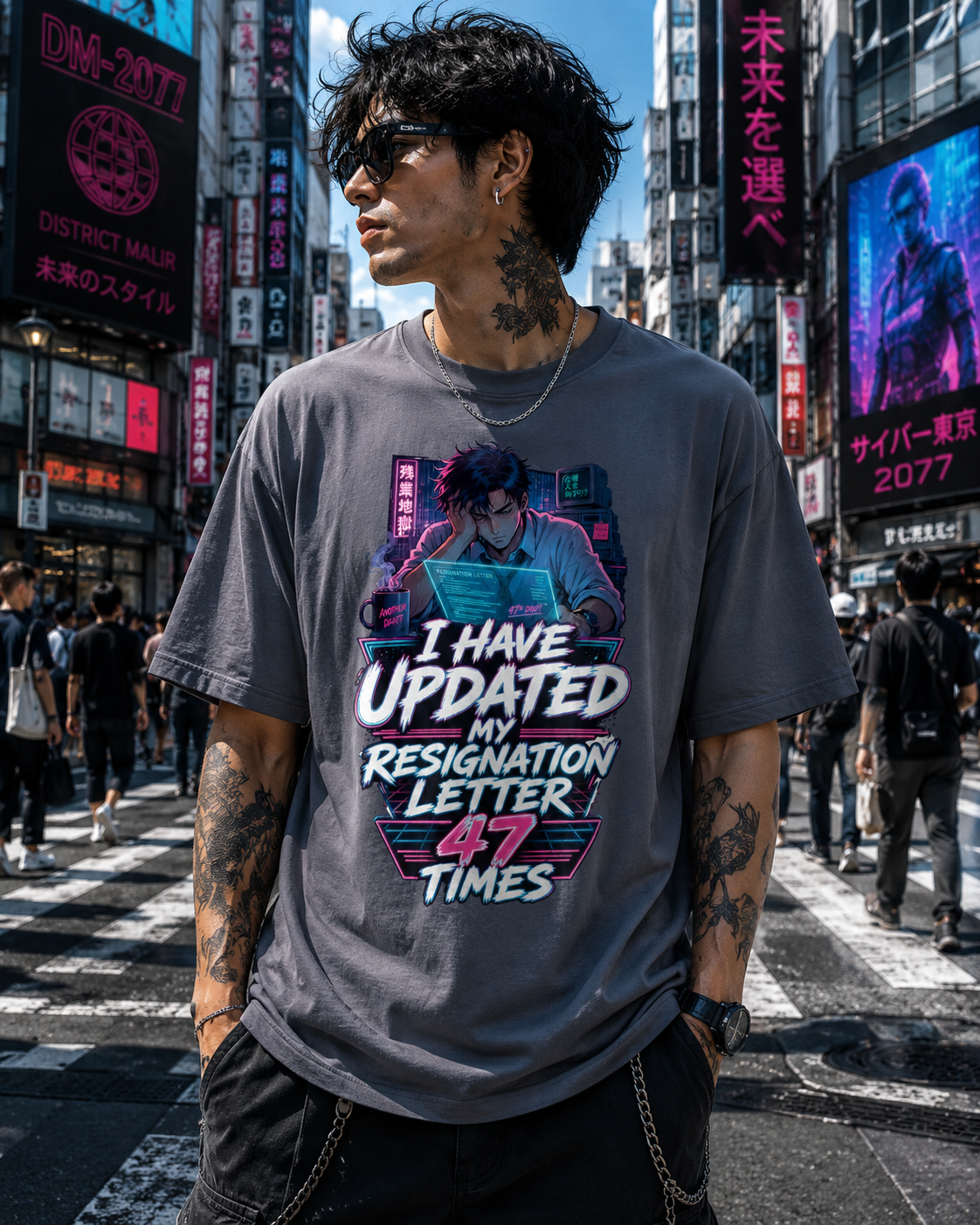 A man wearing a gray graphic t-shirt with a cyberpunk-style print and the text 'I HAVE UPDATED MY RESIGNATION LETTER 47 TIMES' stands in a busy city street in Tokyo, Japan, with neon signs in the background.
